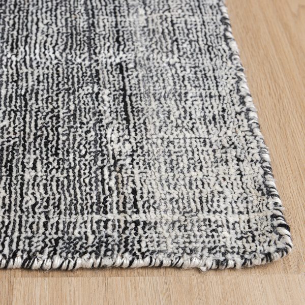 Handgewebter Wollteppich in Schwarz und Weiß - Image 6